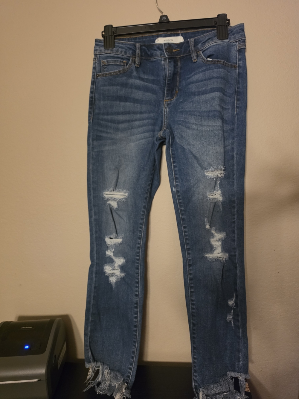 Distressed Dark Blue Skinny Jeans with Frayed Hem